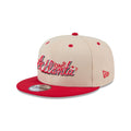 https://cdn.shopify.com/s/files/1/0601/2554/4675/files/60586765_9FIFTY_TEAMART_ATLBRA_OTC_3QL.jpg?v=1728999913
