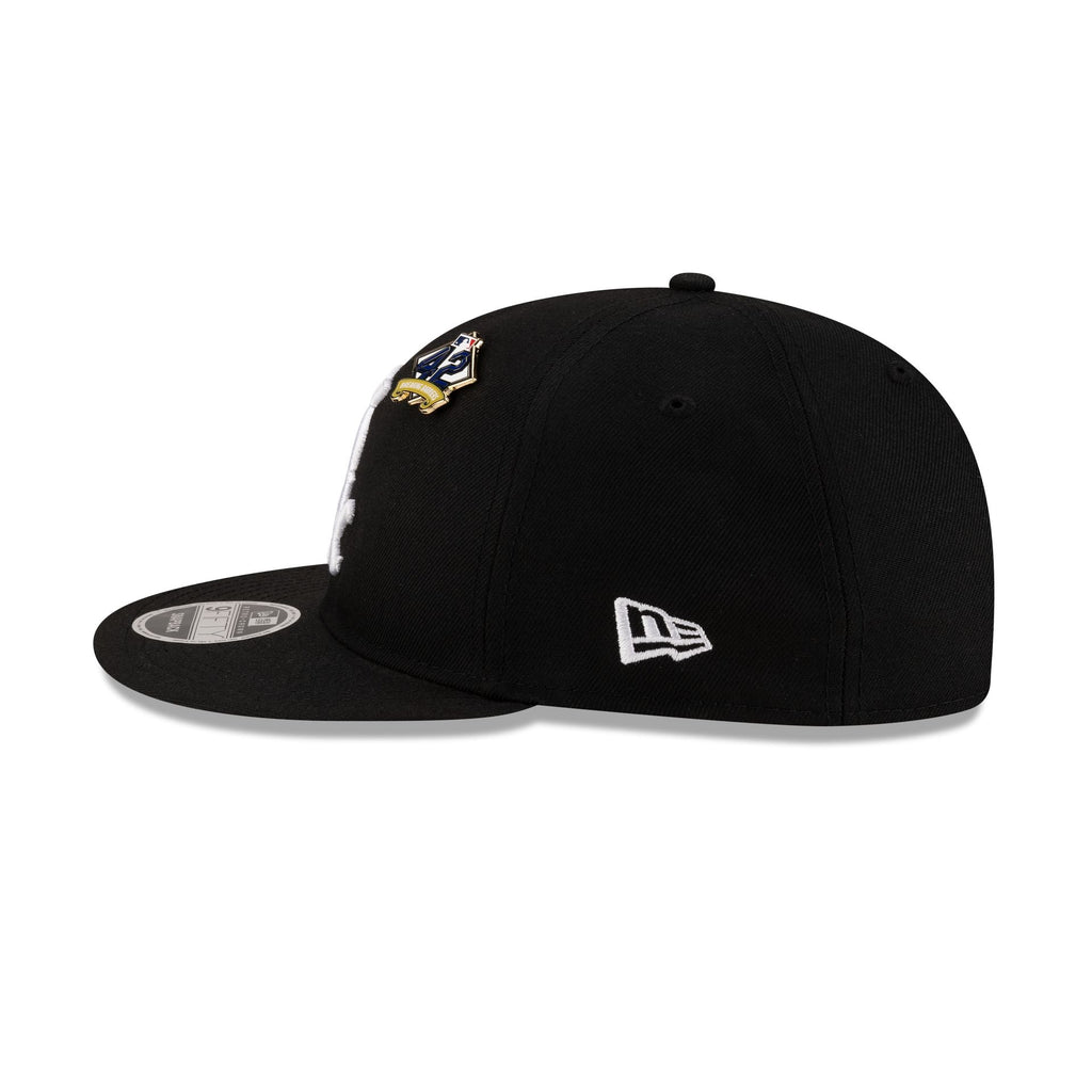 https://cdn.shopify.com/s/files/1/0601/2554/4675/files/60662278_RC9FIFTY_JRD25_CHIWHI_BLK_LSIDE.jpg?v=1741724238
