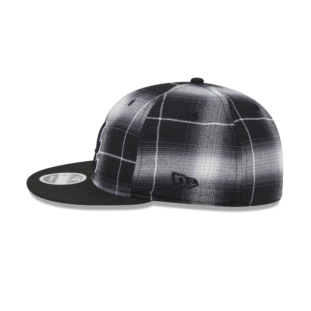 https://cdn.shopify.com/s/files/1/0601/2554/4675/files/60723927_RC9FIFTY_950RCPLAID25830_ATLBRA_BLK_LSIDE.jpg?v=1756141600
