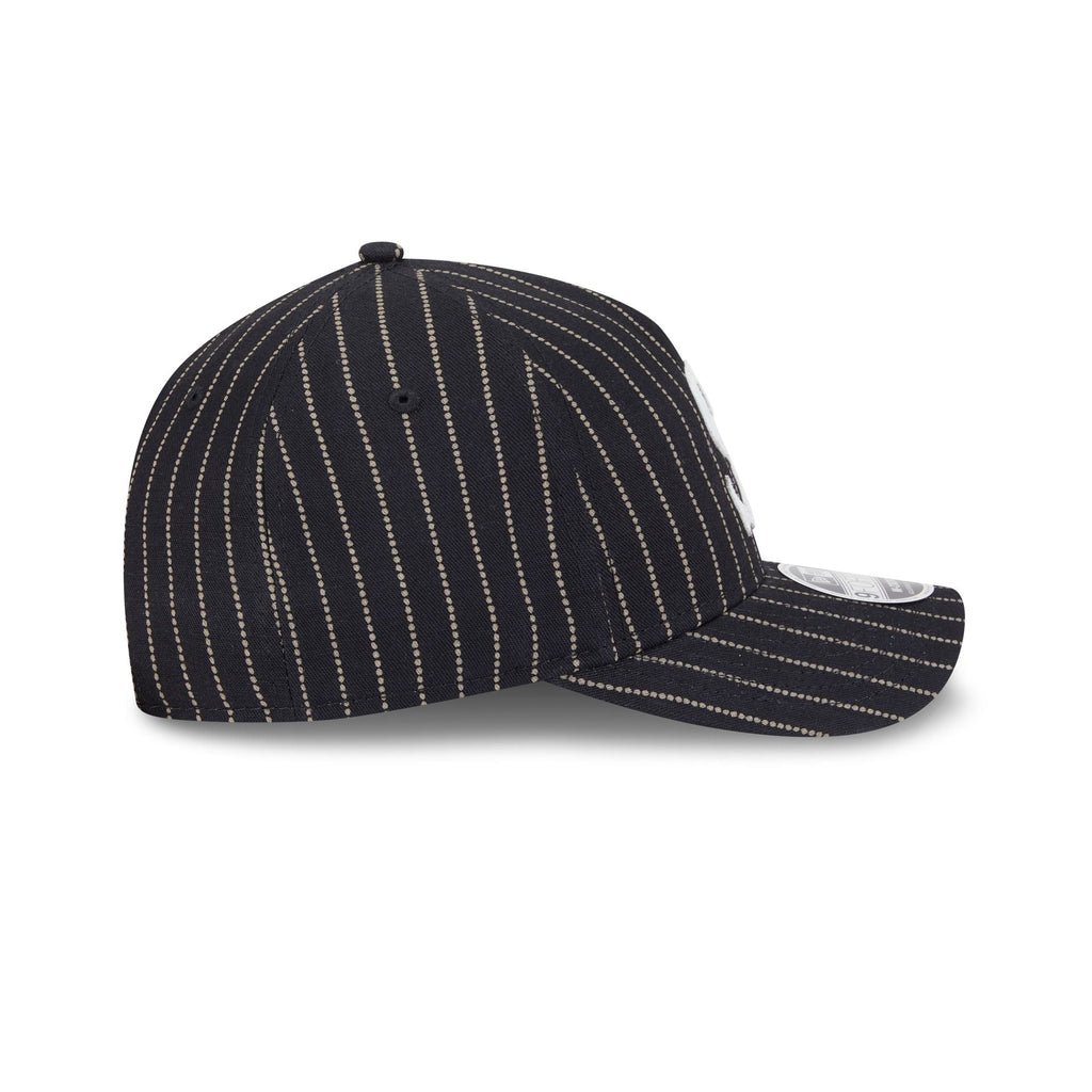 https://cdn.shopify.com/s/files/1/0601/2554/4675/files/60745185_9FORTYMCAF_AZTECPATTERN9TWENTY26_CHIWHI_NVY_RSIDE.jpg?v=1746108049