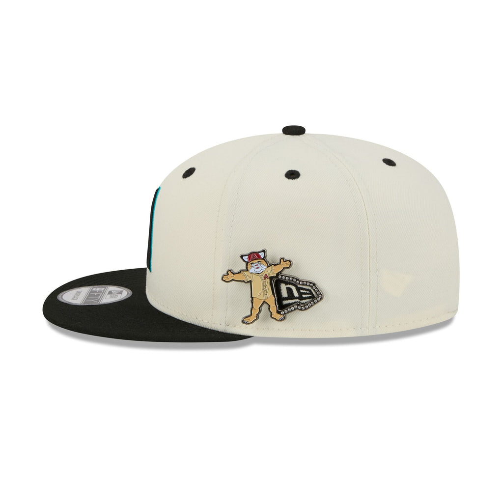https://cdn.shopify.com/s/files/1/0601/2554/4675/files/60758455_9FIFTY_MASCOTPIN26993_ARIDIA_CHW_LSIDE.jpg?v=1763476290