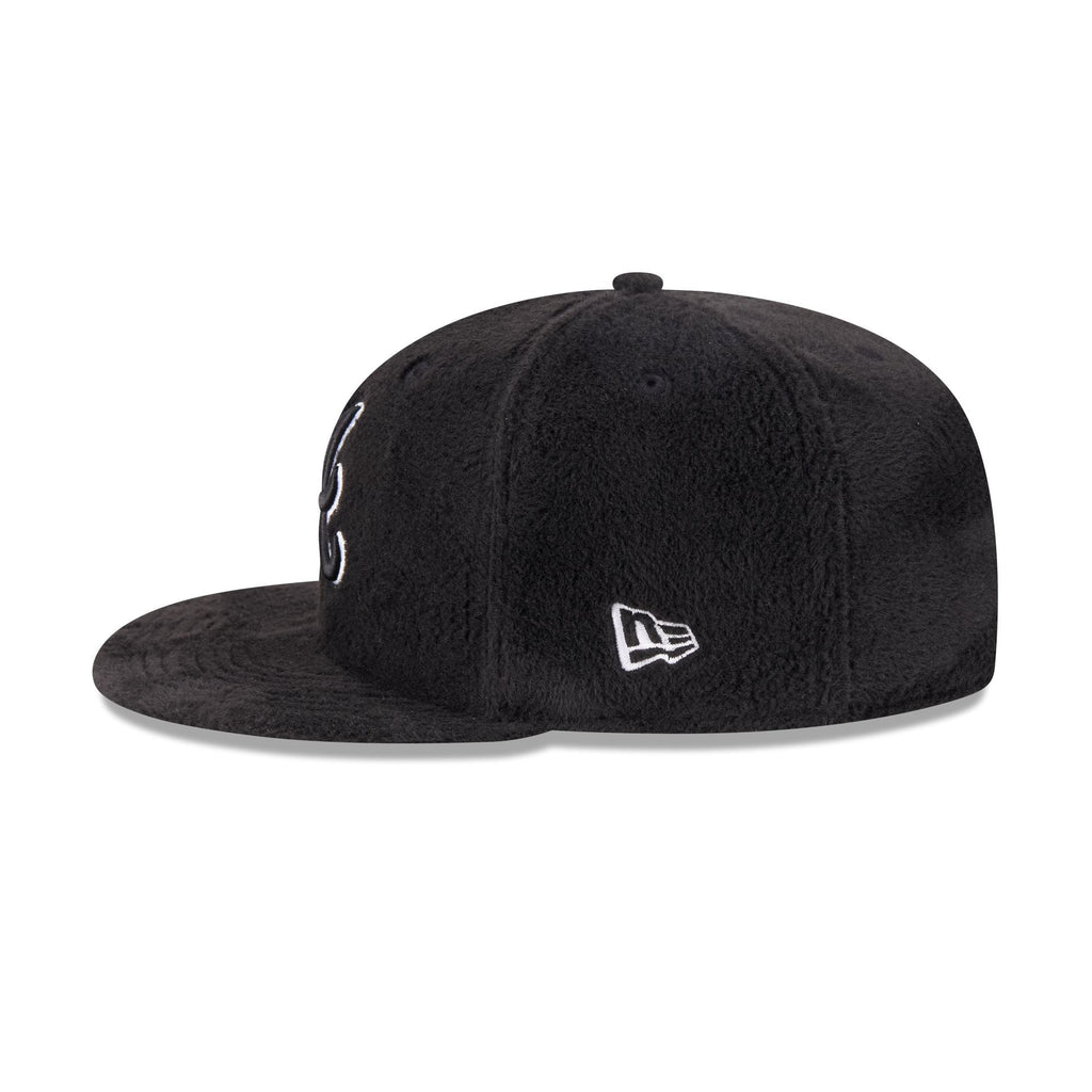https://cdn.shopify.com/s/files/1/0601/2554/4675/files/60832815_59FIFTY_LifestyleEnergy_ATLBRA_BLK_LSIDE.jpg?v=1764616396