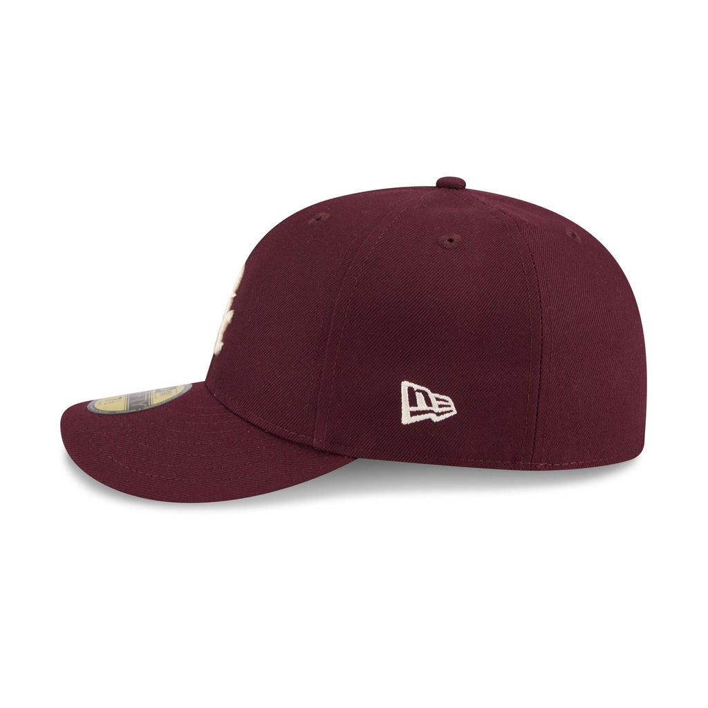 https://cdn.shopify.com/s/files/1/0601/2554/4675/files/60842305_59FIFTY_CC59FIFTYPC30807_CHIWHI_MRN_LSIDE.jpg?v=1763569070