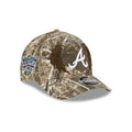 https://cdn.shopify.com/s/files/1/0601/2554/4675/files/60846841_9FORTYMCAF_COLLAB25_MLBXWARRENLOTAS_ATLBRA_CAMO_3QR.jpg?v=1759501577