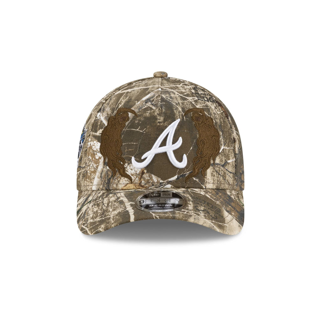 https://cdn.shopify.com/s/files/1/0601/2554/4675/files/60846841_9FORTYMCAF_COLLAB25_MLBXWARRENLOTAS_ATLBRA_CAMO_F.jpg?v=1759501577