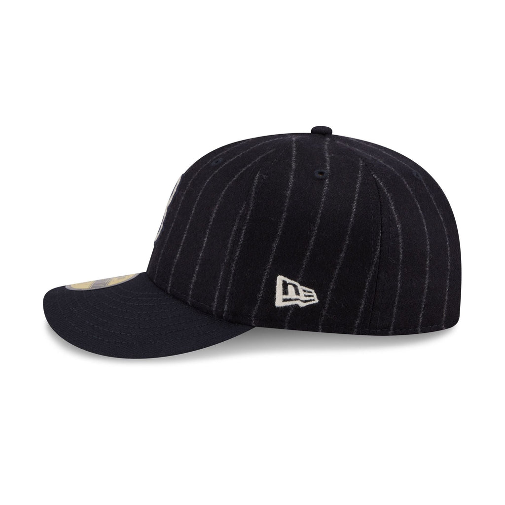 https://cdn.shopify.com/s/files/1/0601/2554/4675/files/60852002_59FIFTY_LifestyleEnergy_BOSRED_WNP_LSIDE.jpg?v=1768341459
